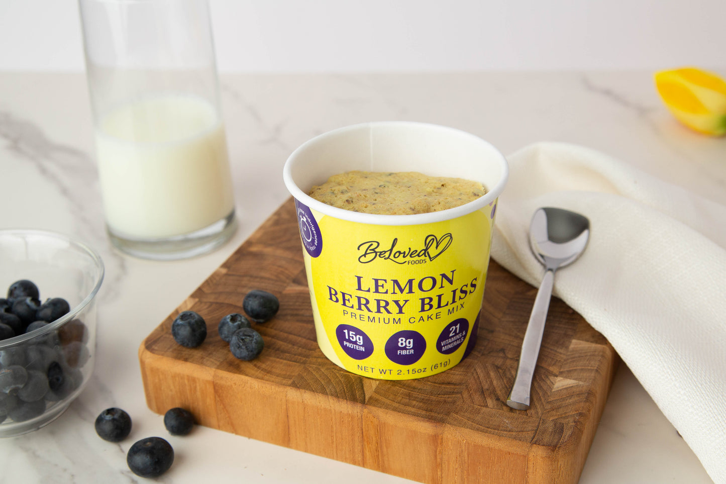 Lemon Berry Bliss Premium Cake Mix with zesty lemon base and real bits of blueberries